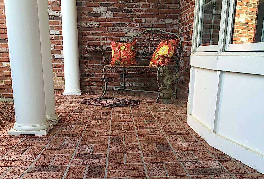 Brick colored stamped concrete patio
