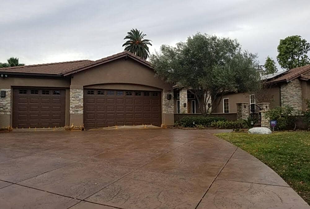 Stained concrete driveway in a residential area