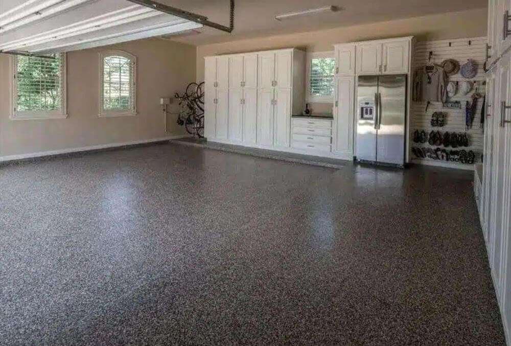garage floor with white cabinet organizer
