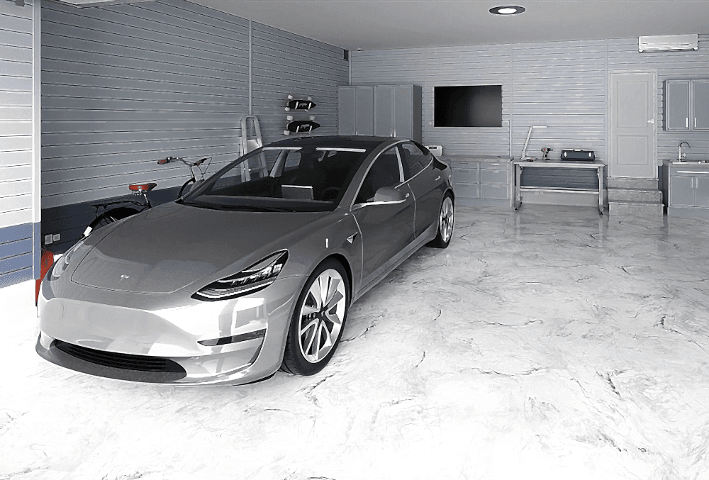 A bicycle and a silver car parked inside a garage with a clean floor