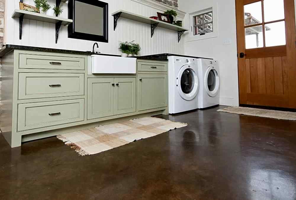 laundry area stained concrete flooring