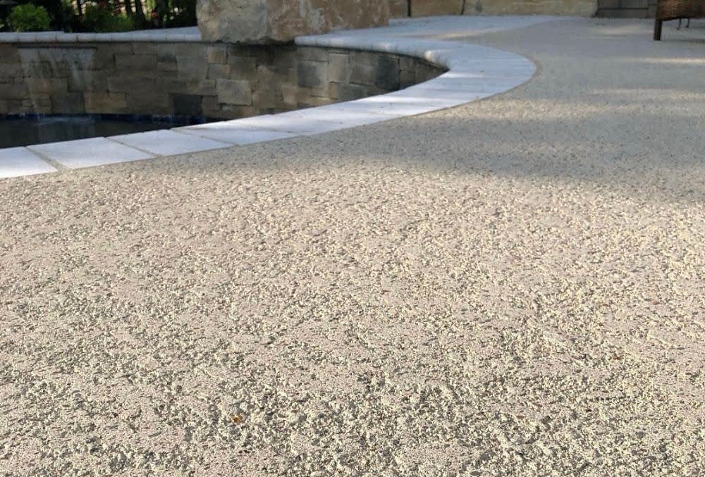 close up finishing for a concrete pool deck
