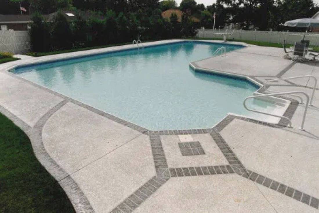 textured concrete pool deck